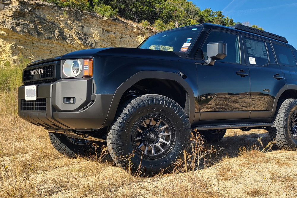 Front view of a black Land Cruiser