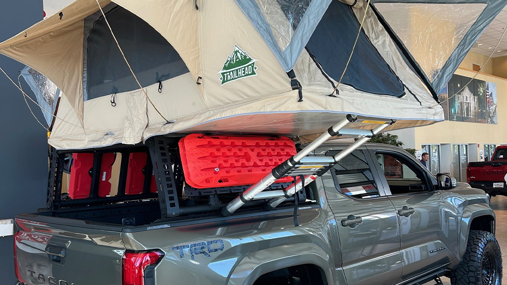 Tacoma with a tent on top of it